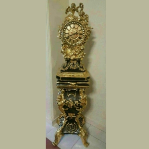 کنسول ساعت رنگ قهوه ای و ورق طلا